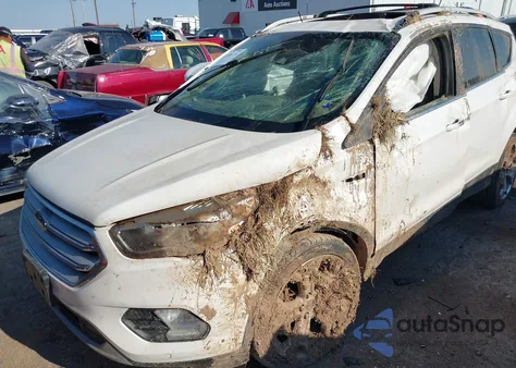 2018 Ford Escape Titanium z USA, uszkodzony, nr VIN 1FMCU0J95JUA71473